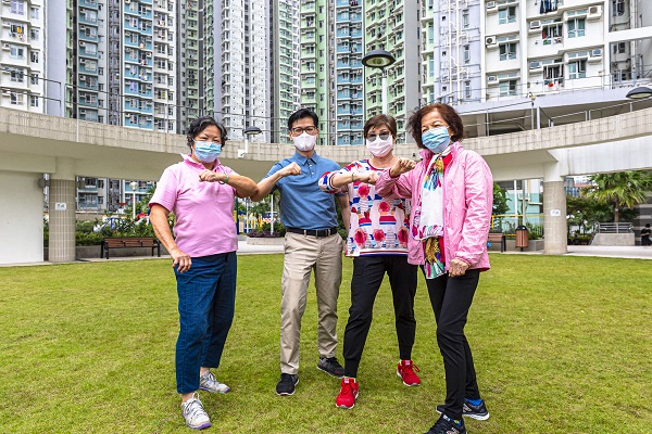 Photo: Deputy Director of Housing (Estate Management), Mr Ricky Yeung (second left), elbow shakes with elderly tenants to say “Hi”