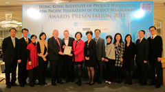 Photo: Mr D W Pescod (fifth from left), Permanent Secretary for Transport and Housing (Housing), and the project team receive an award from Dr Bill Young (sixth from left), President of the APFPM.