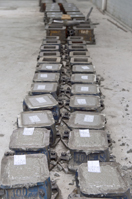 Photo: Concrete cubes being produced (left); production information labels on the concrete cubes (middle); cubes being placed in a curing pool (right).