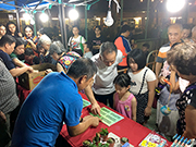 相片：兴东邨嘉年华的急口令游戏摊位，让居民认识植物的护理知识。