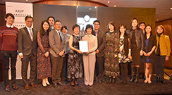 Photo: The Deputy Director of Housing (Development and Construction) Ms Connie Yeung (middle), together with the project team, receives on behalf of the HD the Silver Award of the HKIP Awards 2018.