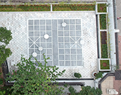 Photo: The courtyard in a Chinese chessboard design.