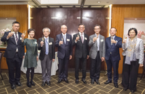 Photo: HA Chairman, Mr Frank Chan Fan (fourth left), together with Committee Chairmen and guests, makes a toast at the annual dinner.