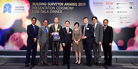 Photo: The HD team receiving the Caring Practice Award pictured with the award presenter (fourth left).