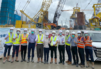 Photo: Ms Connie Yeung, Deputy Director of Housing (Development and Construction) (sixth left), together with the senior management of the works contractor, visits the site of the Foundation for Public Housing Development at Kai Tak Site 2B2.