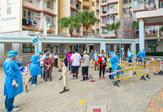 Photo: About 40 HD staff worked in a three-day operation on compulsory testing notice for two blocks of Ping Tin Estate in late March.