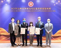 相片：运输及房屋局常任秘书长（房屋）王天予（左二）、房屋署副署长（发展及建筑）梁健文（左六）与刘礼贤（左三）、刘伟英（左五）和陈颕芝（左四）合照。