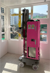 相片：機械人為單位內牆自動噴塗油漆。