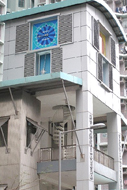 相片：四面鐘樓是健明邨的地標。