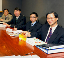 Photo: Members of the project team share their experience in developing the IPA. 