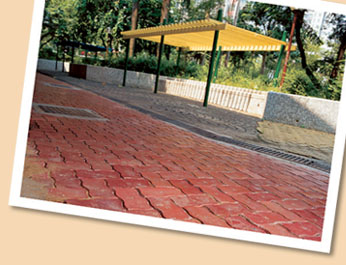 Paving blocks made of recycled material being trialled at Tsing Yi Estate.