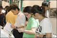 相片：市民在留言冊上分享的故事與展出的相片一樣值得一再回味。