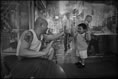 Photo: Brother B, owner of a wanton noodle shop, breaks the generation gap playing with the son of a "kaifong".