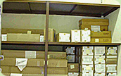 Photo: Properly labelled boxes of waste inside a secure, designated storage area.