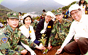 Photo: Mr Lau Kai-hung, Deputy Director / Estate Management (1st from right) takes part in the Hong Kong Tree Planting Day in Wong Nai Uk, Tung Chung.