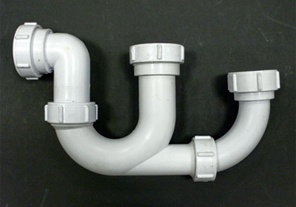 Photo: The Common W-trap Design to the spread of disease