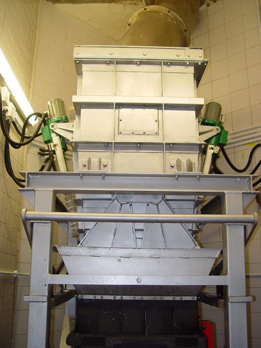 Photo: Refuse Storage & Volume Control Device of a Central Compactor System
