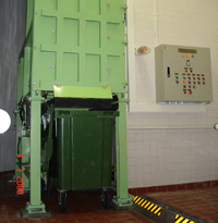 Photo: Small Scale 'Distributed Compactor System' installed in each domestic building