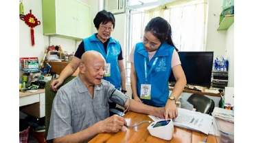 The nursing team of the University of Hong Kong provides health assessment for an elderly tenant at his home